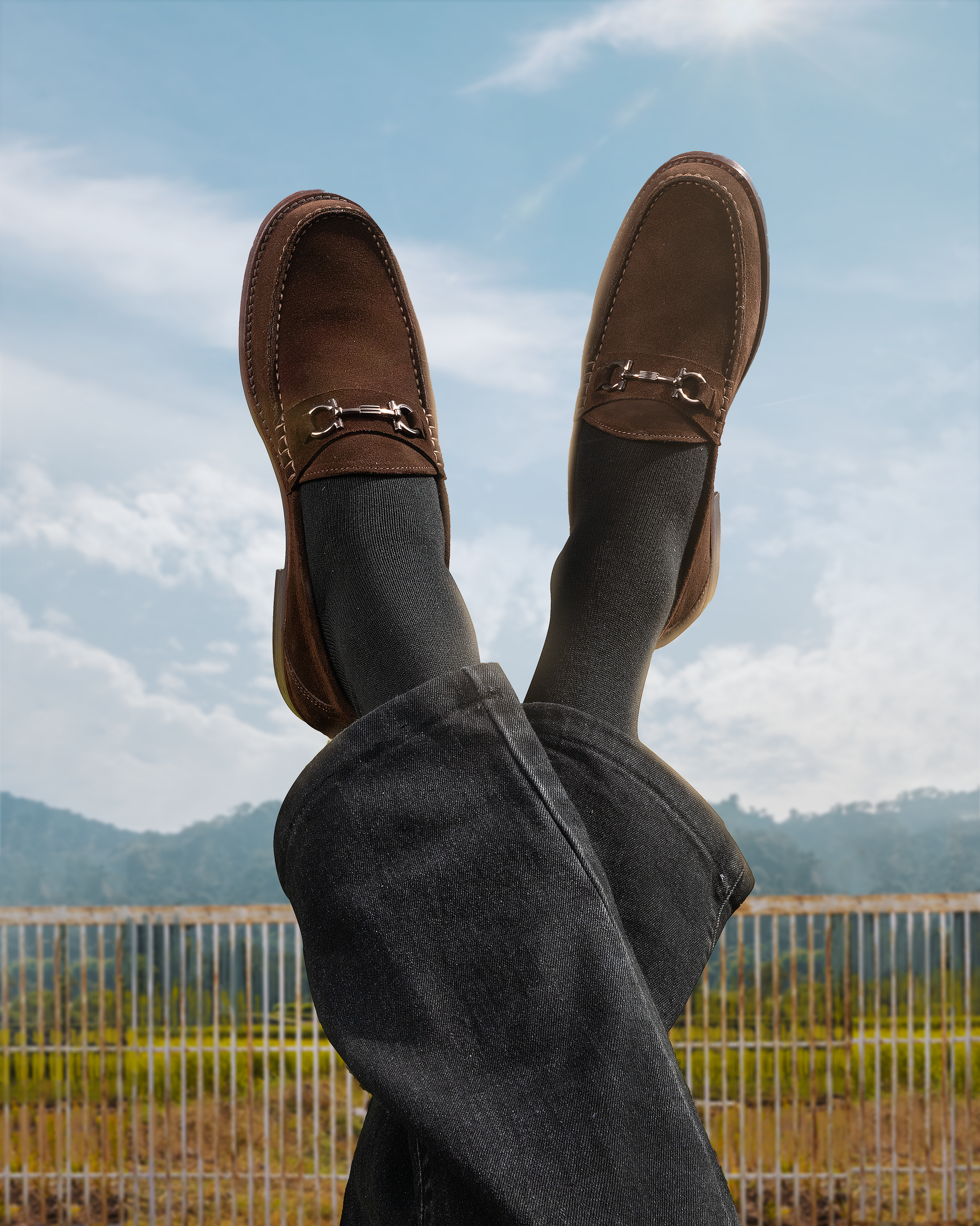 man in brown moccasin shoes 