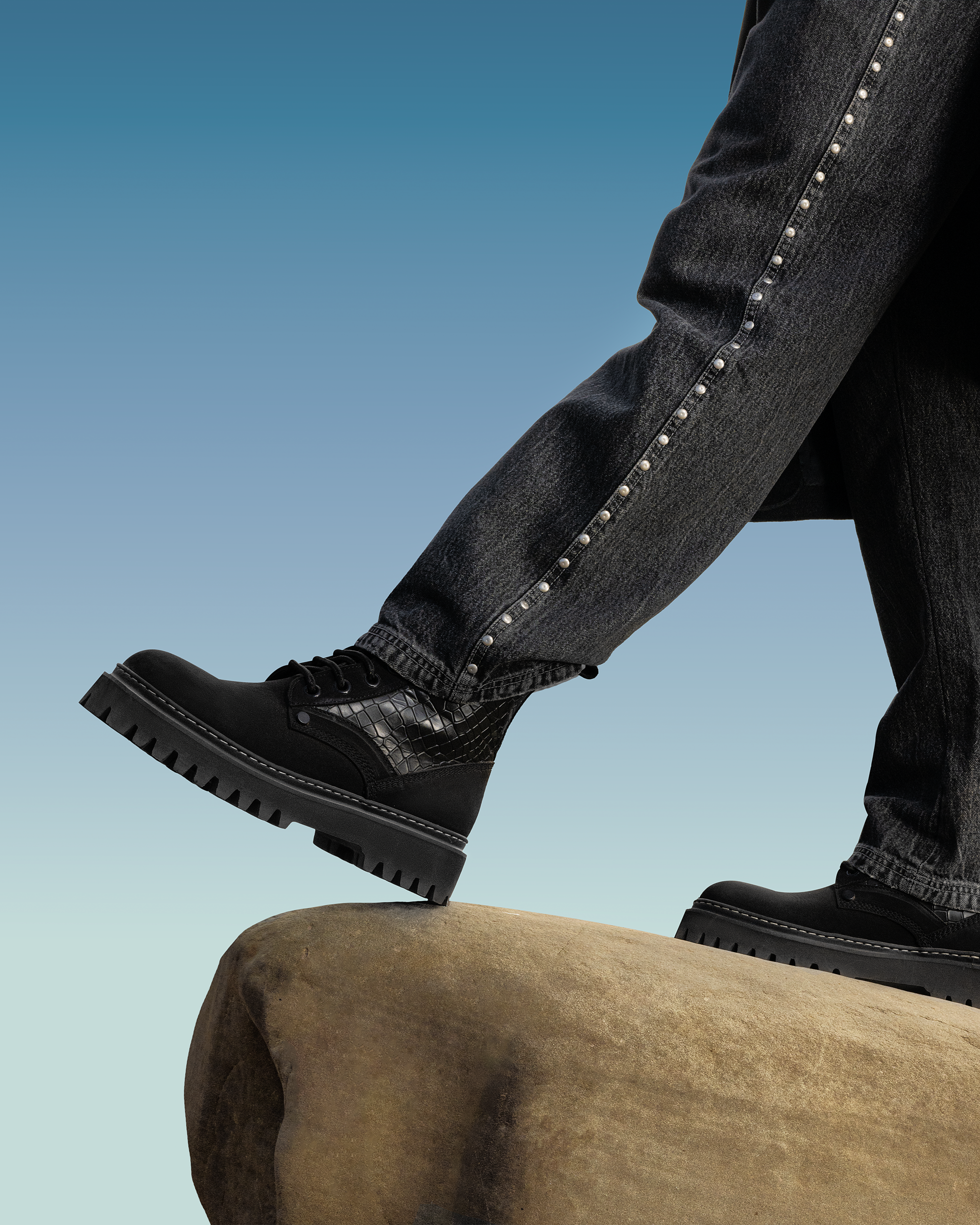 Person wearing black premium shoes​