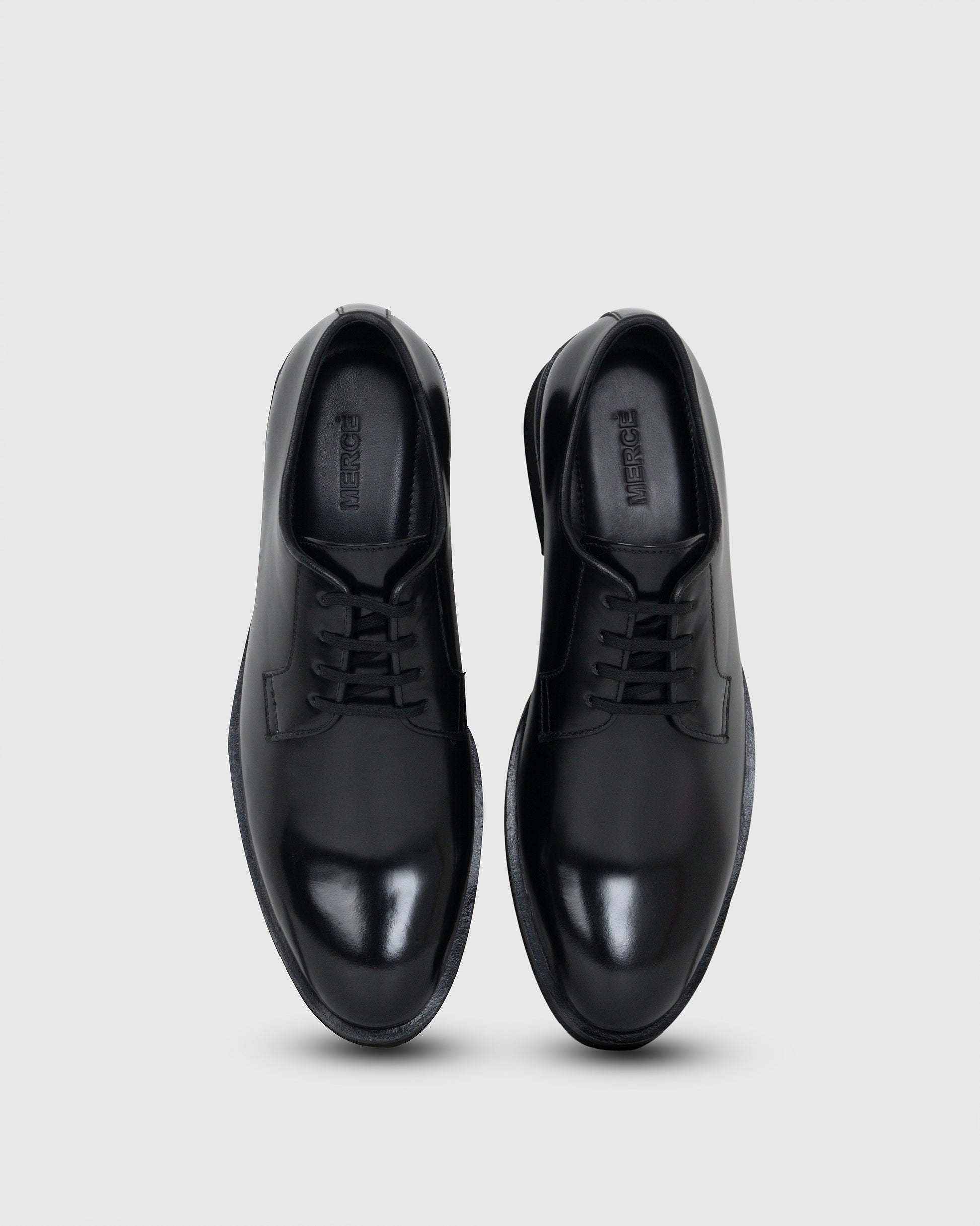 pair of black derby shoes​ for men